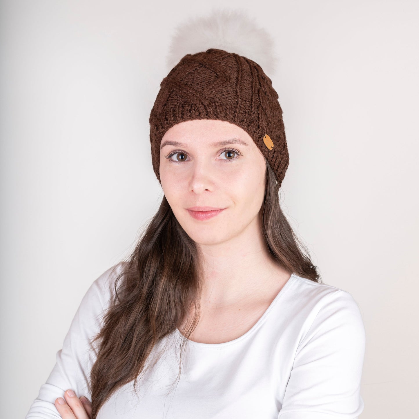 Strickhaube mit Pompon