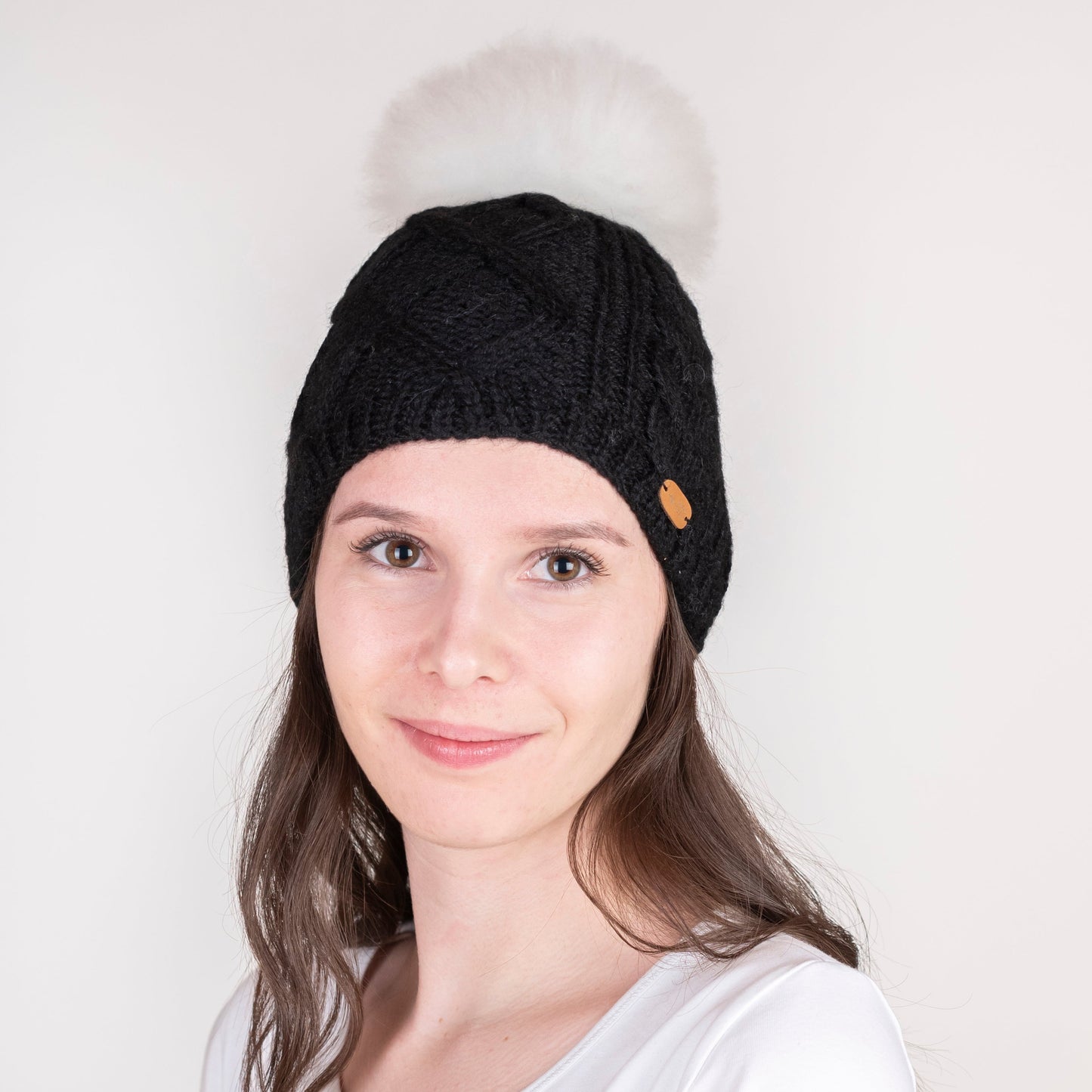 Strickhaube mit Pompon