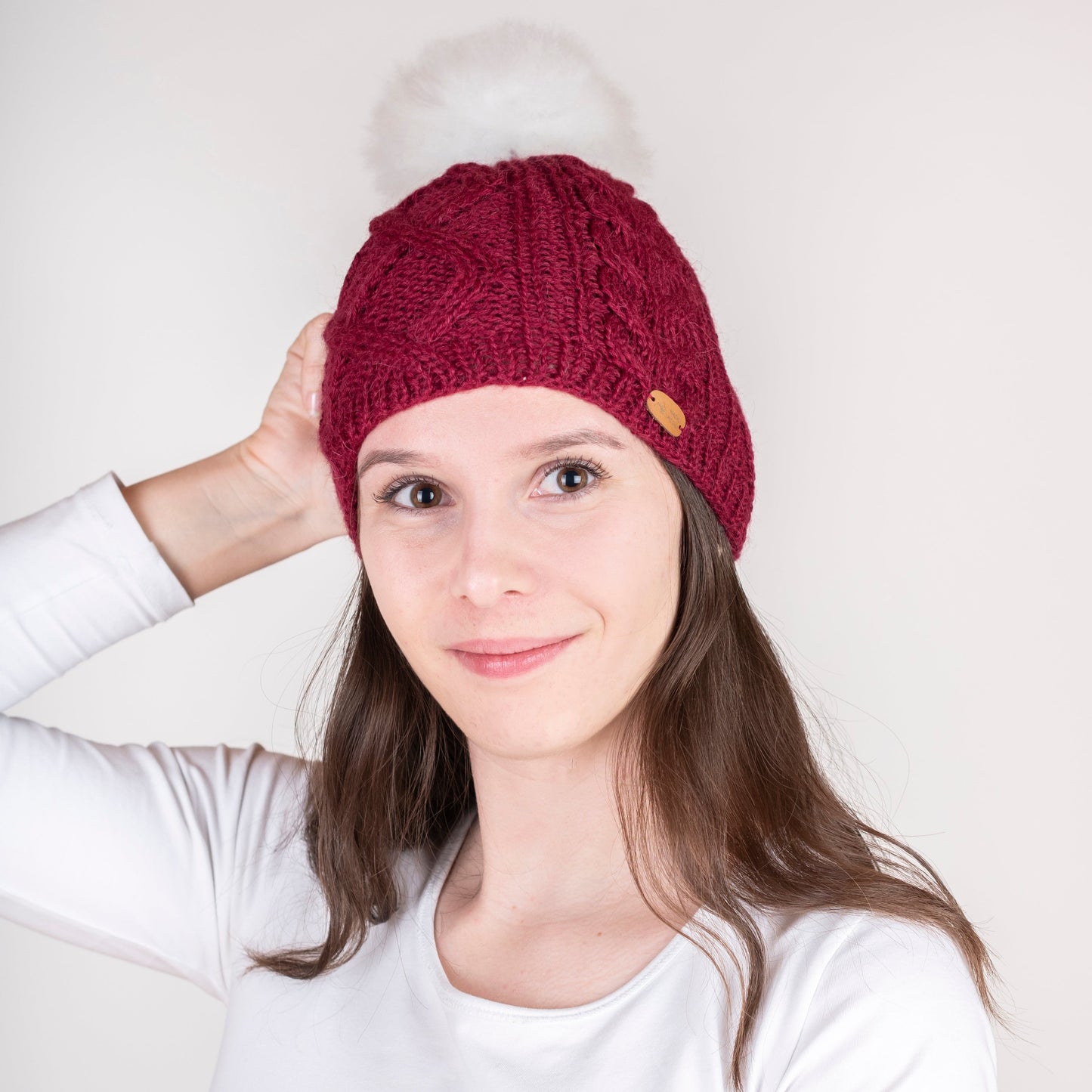 Strickhaube mit Pompon
